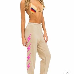 Aviator Nation Beige Joggers with Pink Lightning Bolt